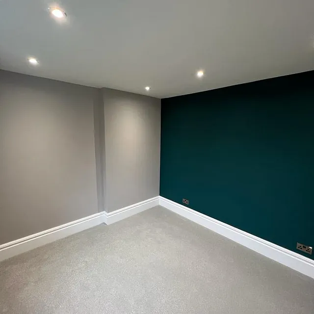 Bedrooms and Bathroom Refurbishment in Chilcompton - finished bedroom with teal wall