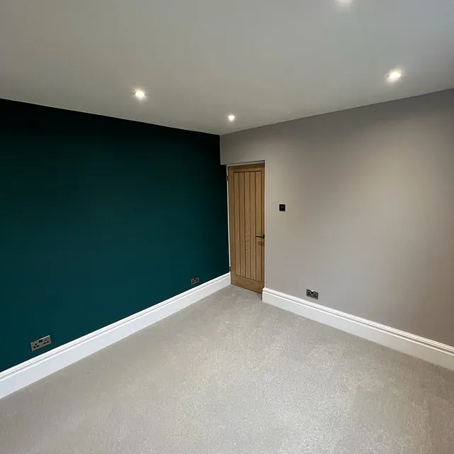 Bedrooms and Bathroom Refurbishment in Chilcompton - finsihed room with teal wall